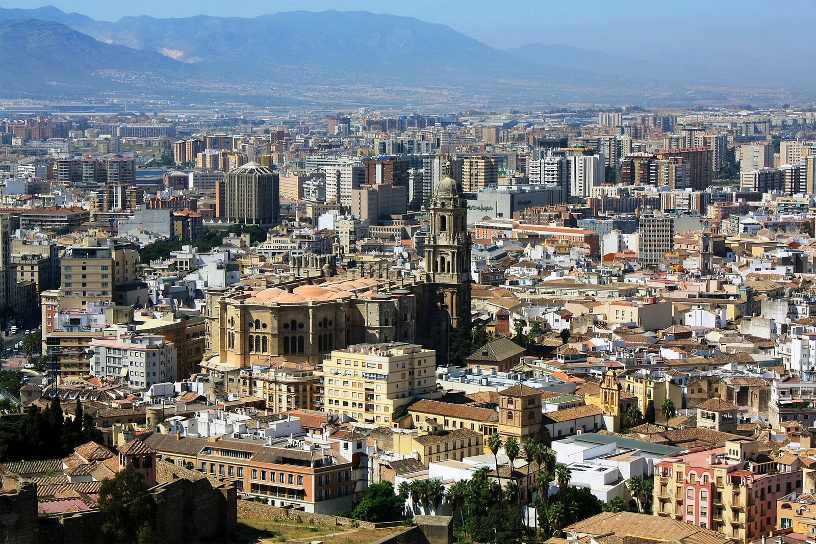 Malaga port, cathedral and Alcazaba hill seen from Gibralfaro