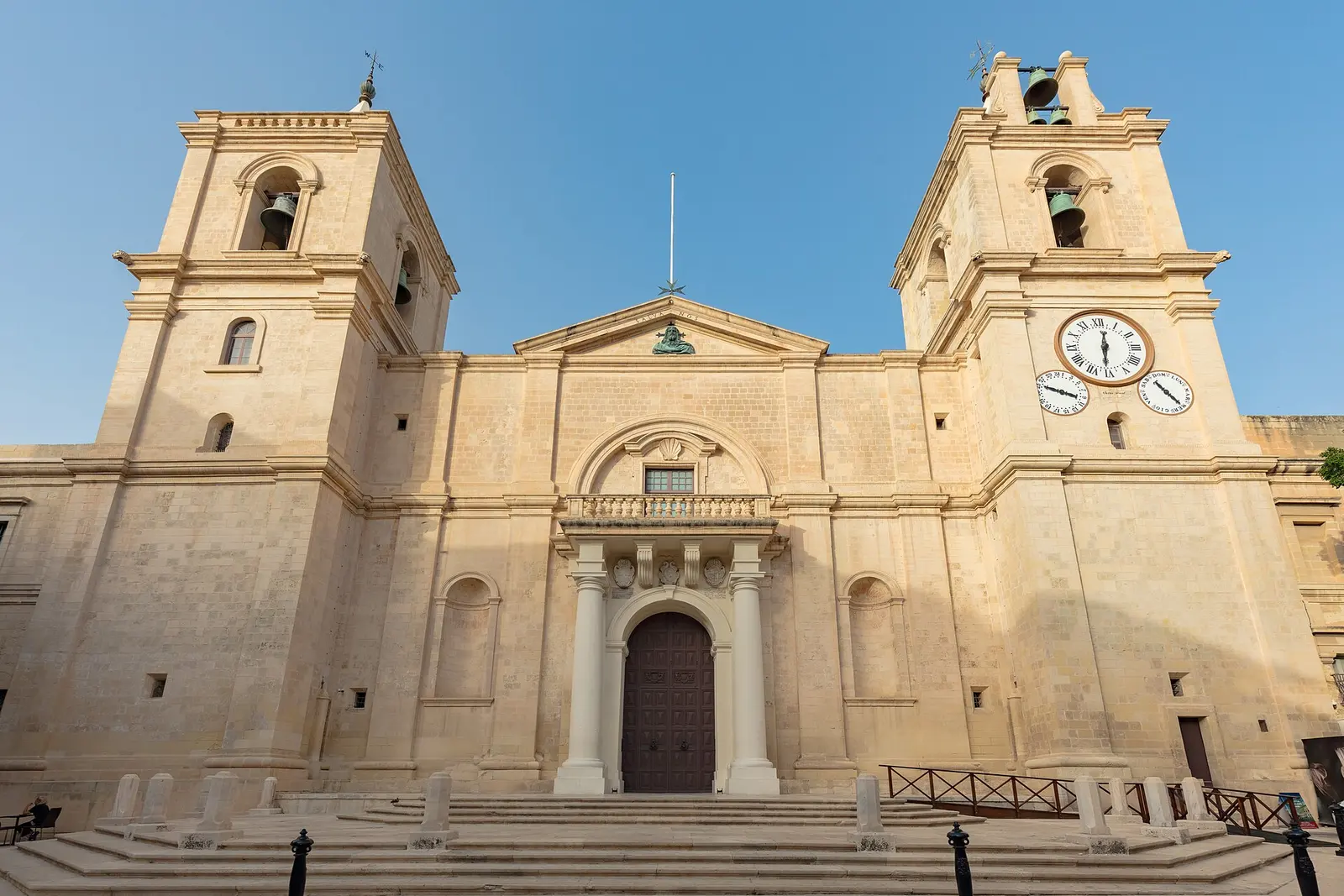 The austere limestone facade of St John's Co-Cathedral in Valletta