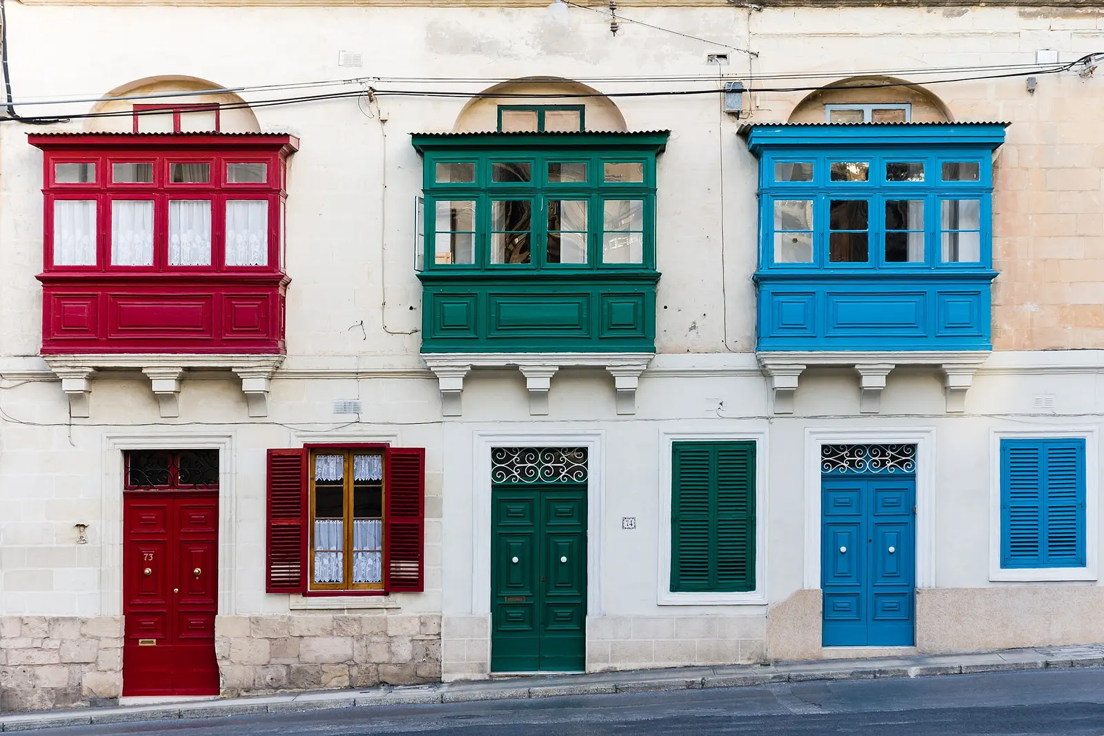 Coloured wooden balconies on a Sliema townhouse