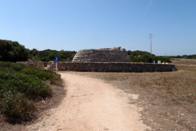 The boat-shaped stone burial chamber of the Naveta des Tudons