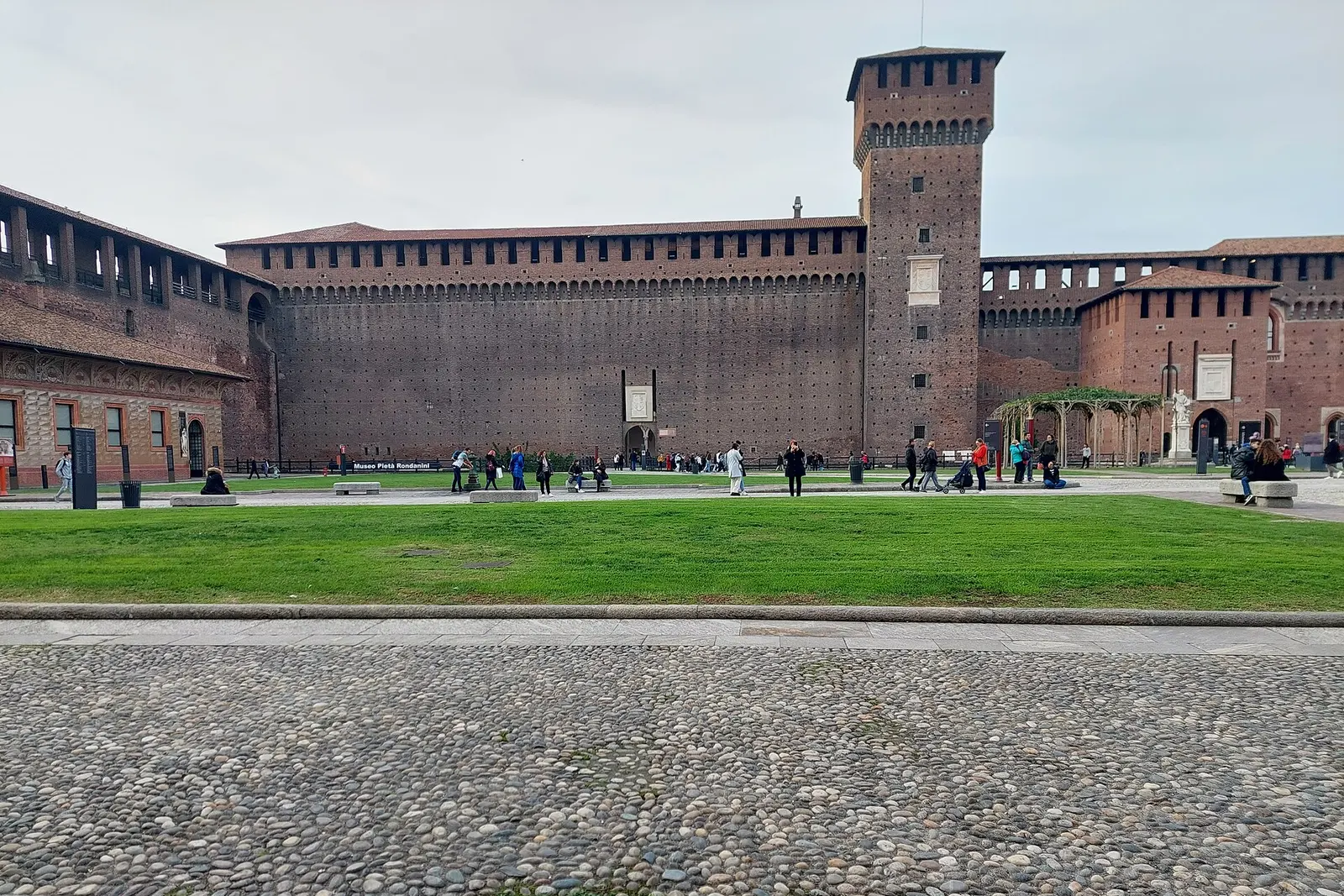 Castello Sforzesco and its tower seen across the parade ground