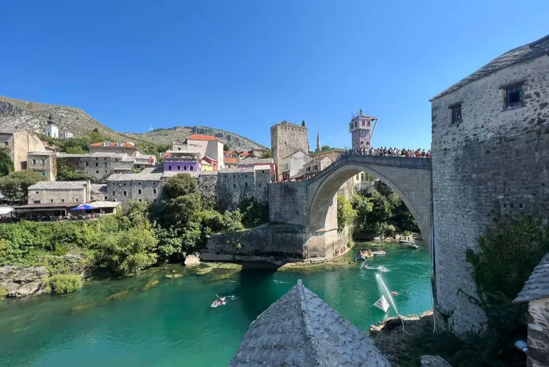 The Stari Most bridge and the green Neretva river in Mostar