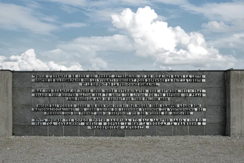 The memorial wall at the Dachau concentration camp memorial site
