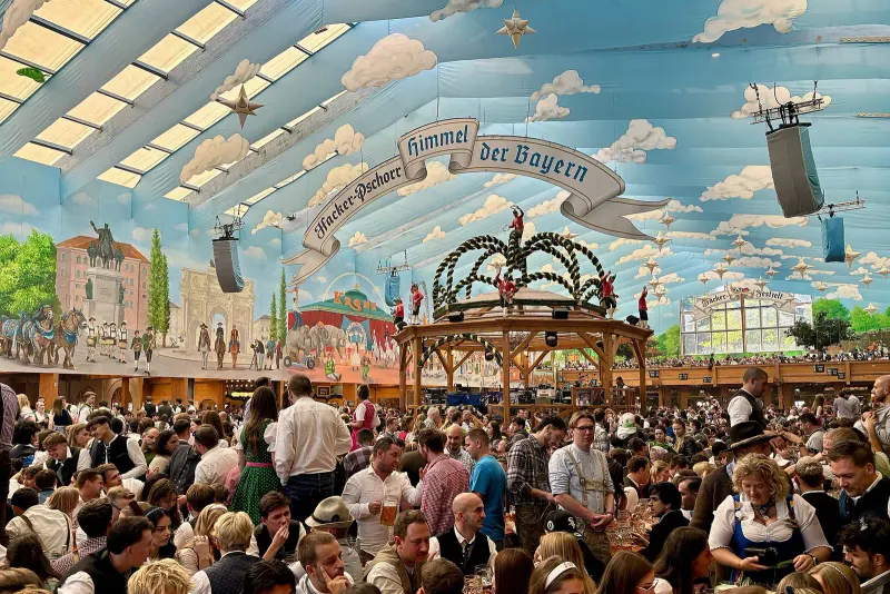 Crowds inside a decorated Oktoberfest beer tent on the Theresienwiese
