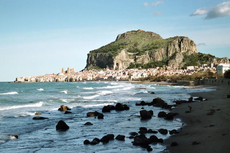 Cefalu cathedral and beach under the Rocca