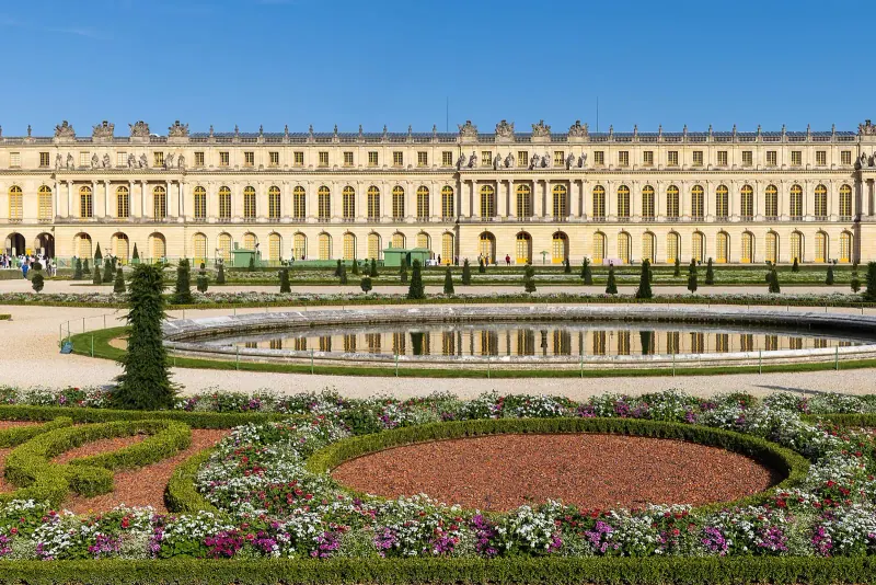 The Palace of Versailles seen across its formal gardens