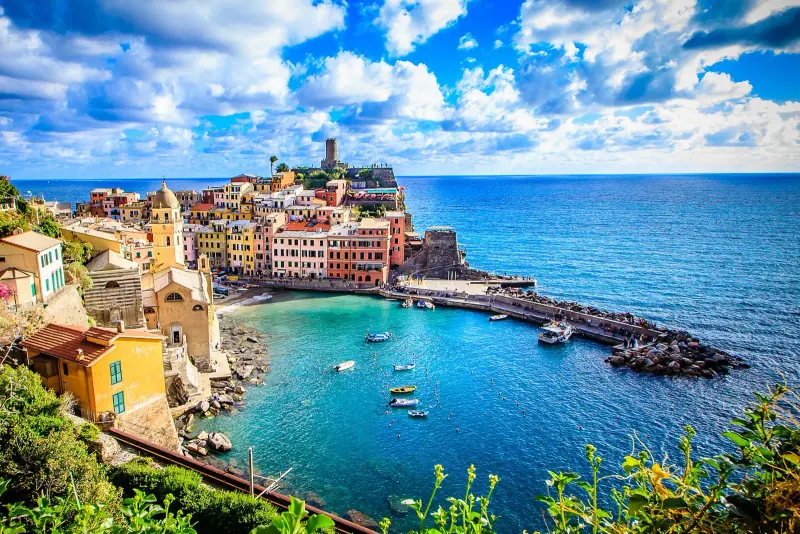 Vernazza's harbour and pastel houses on the Cinque Terre coast