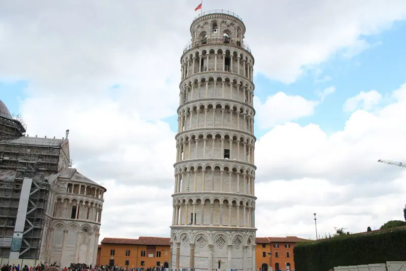 The Leaning Tower of Pisa beside the cathedral dome