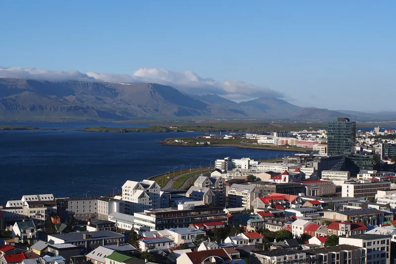 Colorful rooftops and the Hallgrimskirkja tower seen over Reykjavik