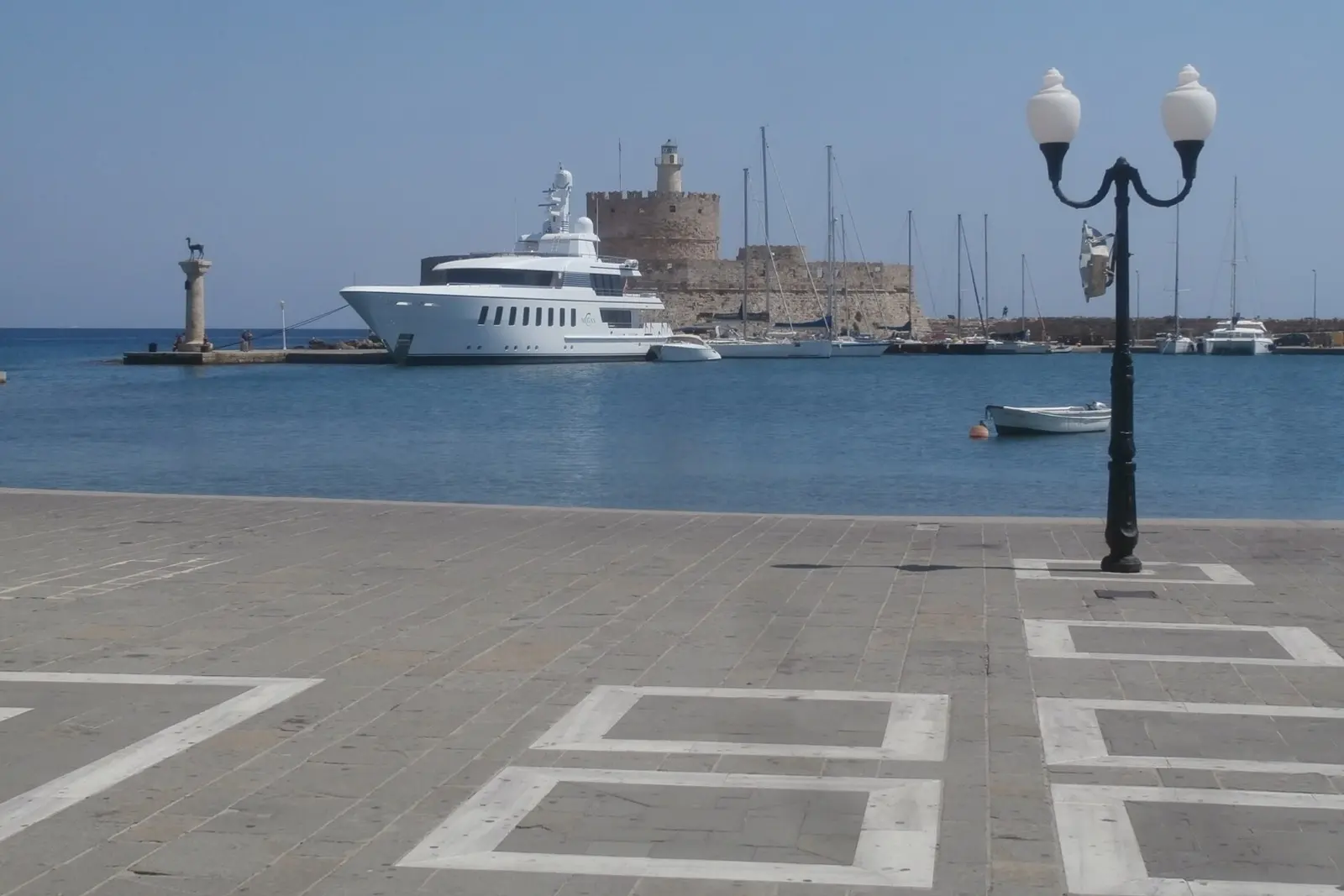 Mandraki harbour with the St Nicholas lighthouse, Rhodes