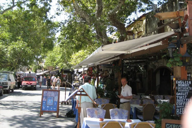 A shaded taverna square in Rhodes old town