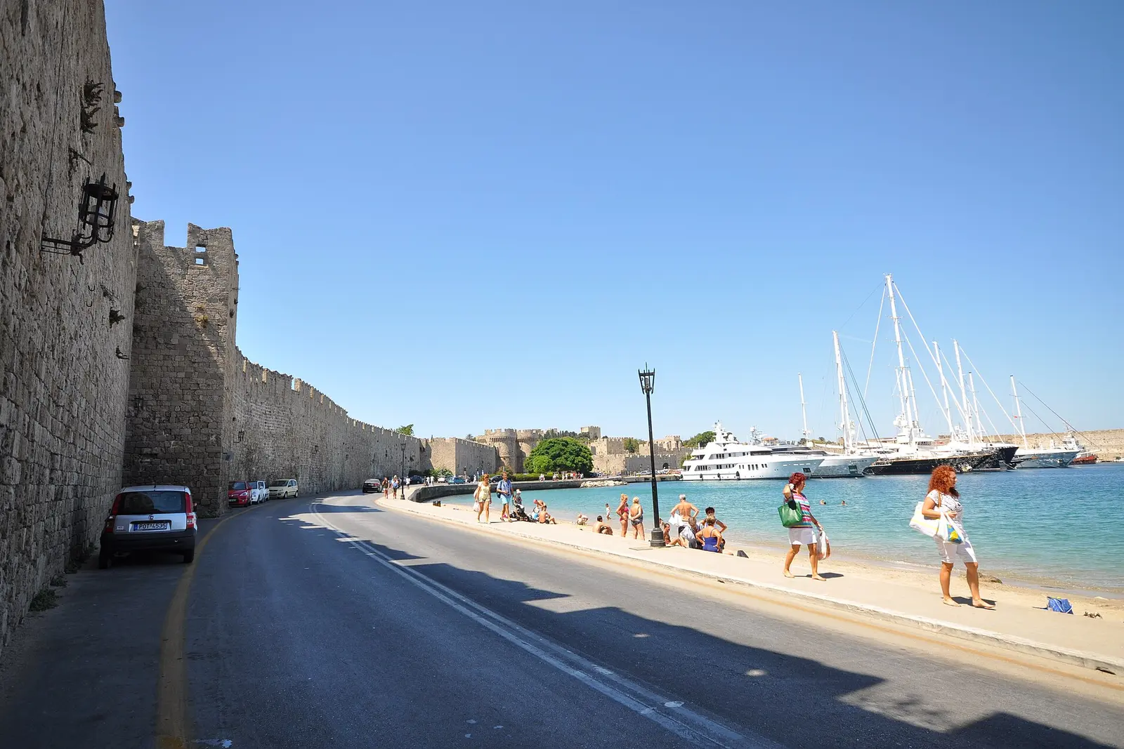 The medieval walls of Rhodes meeting the Commercial Harbour