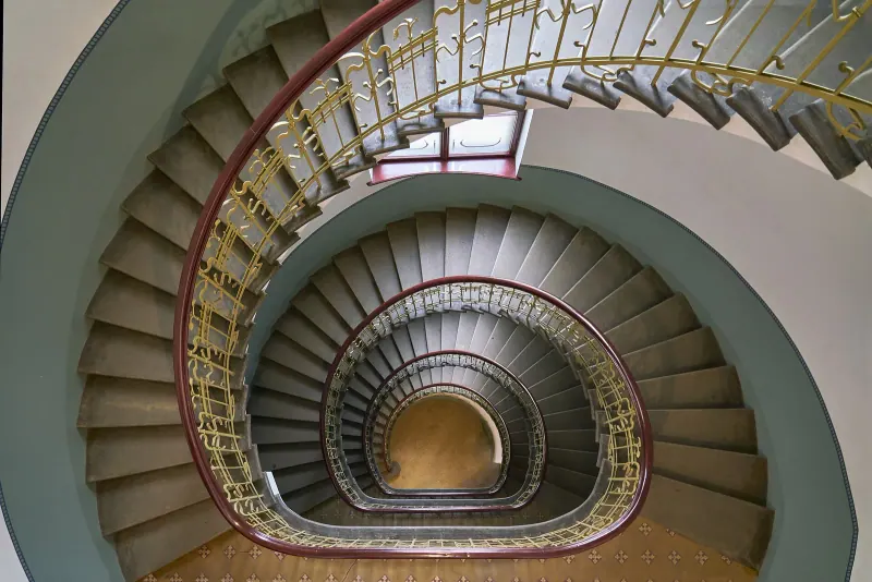 A spiral staircase in Riga's Art Nouveau district