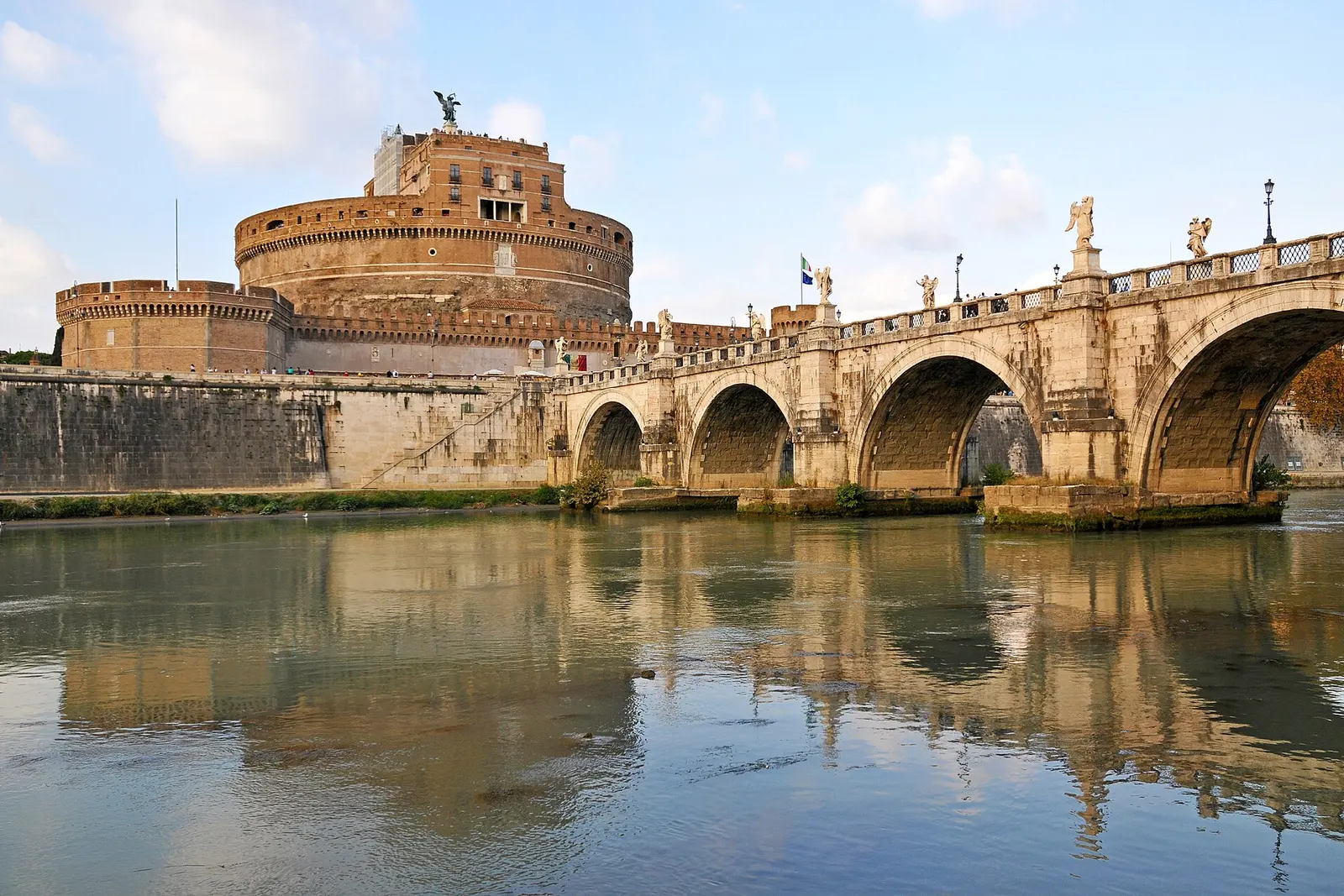 Castel Sant'Angelo and its bridge reflected in the Tiber