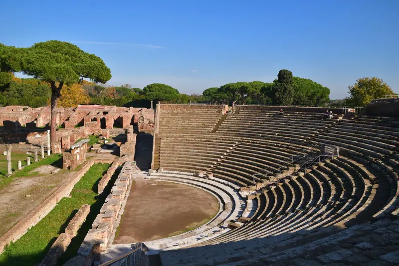 The Roman theatre at Ostia Antica under umbrella pines