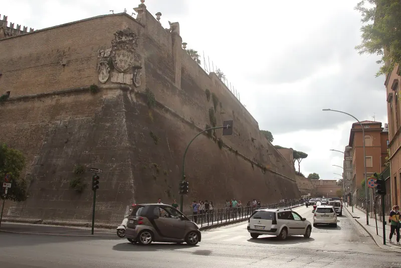 The Vatican walls along a Rome street