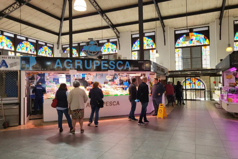 Food stalls inside Salamanca's Mercado Central