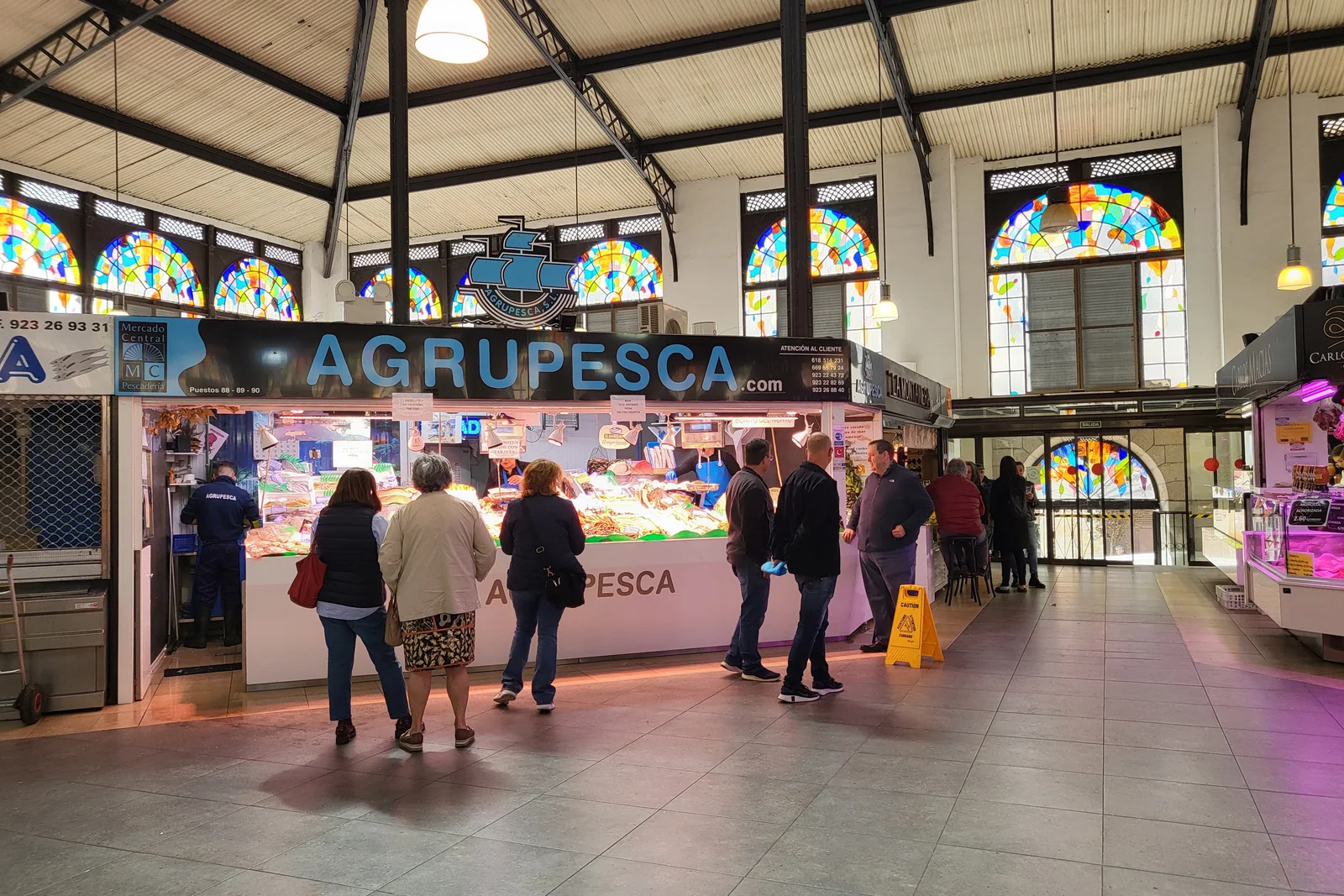 Food stalls inside Salamanca's Mercado Central