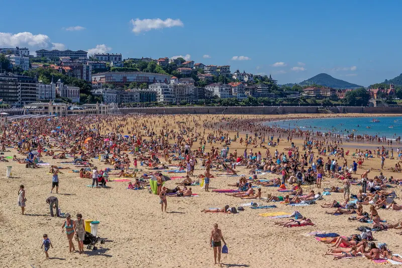 La Concha beach curving around the bay in San Sebastian