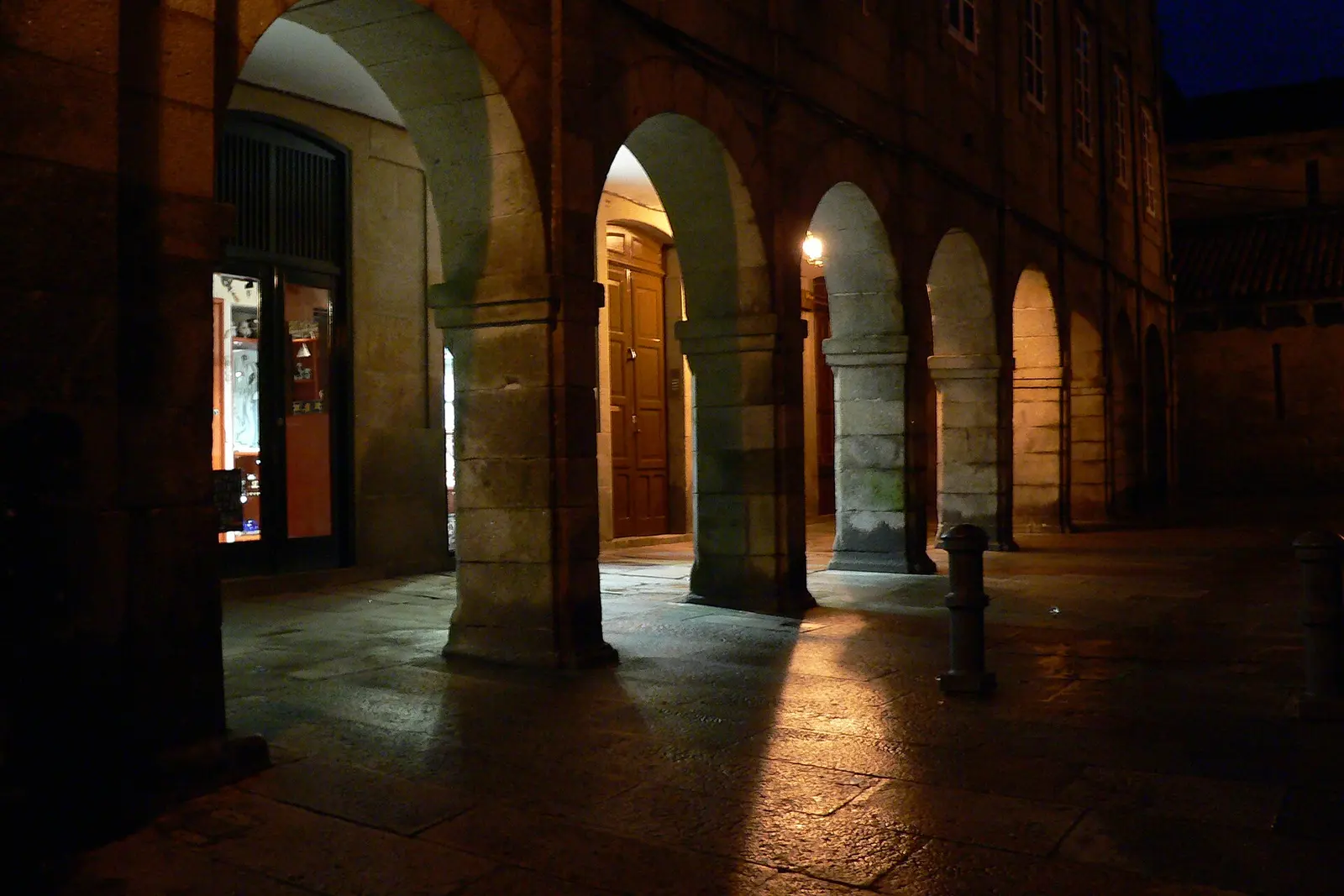 Arcaded Rua do Vilar in Santiago's old town