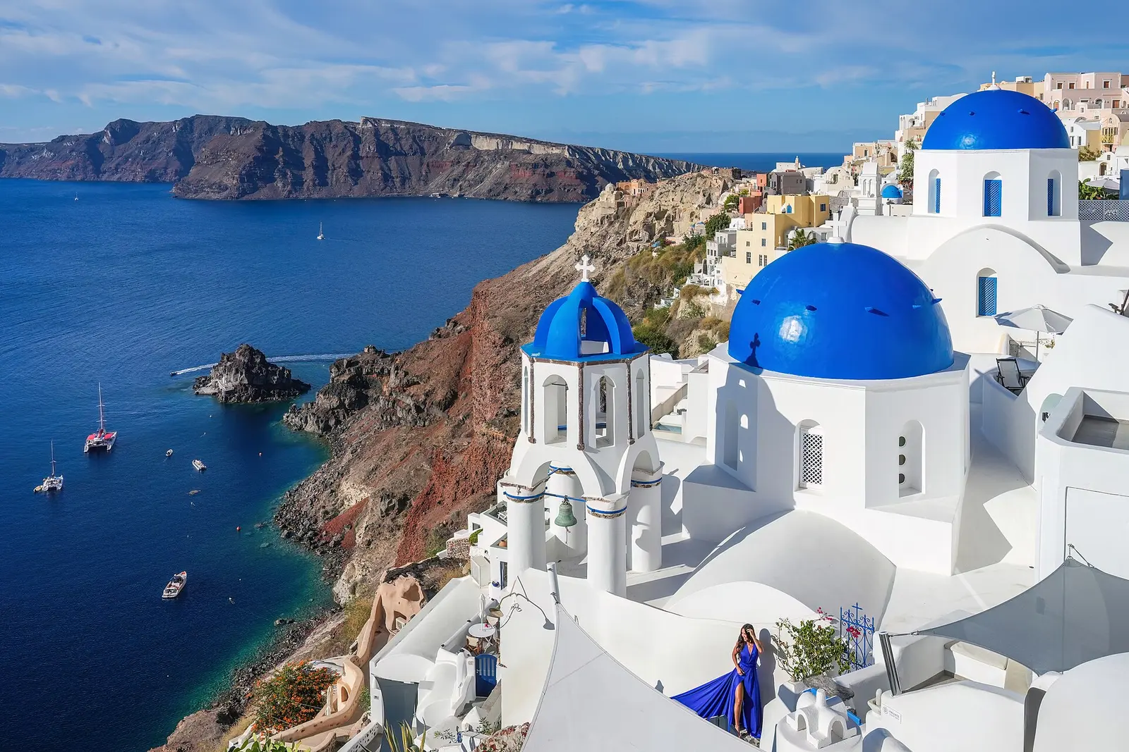 Blue domes of Oia against the deep-blue caldera, Santorini