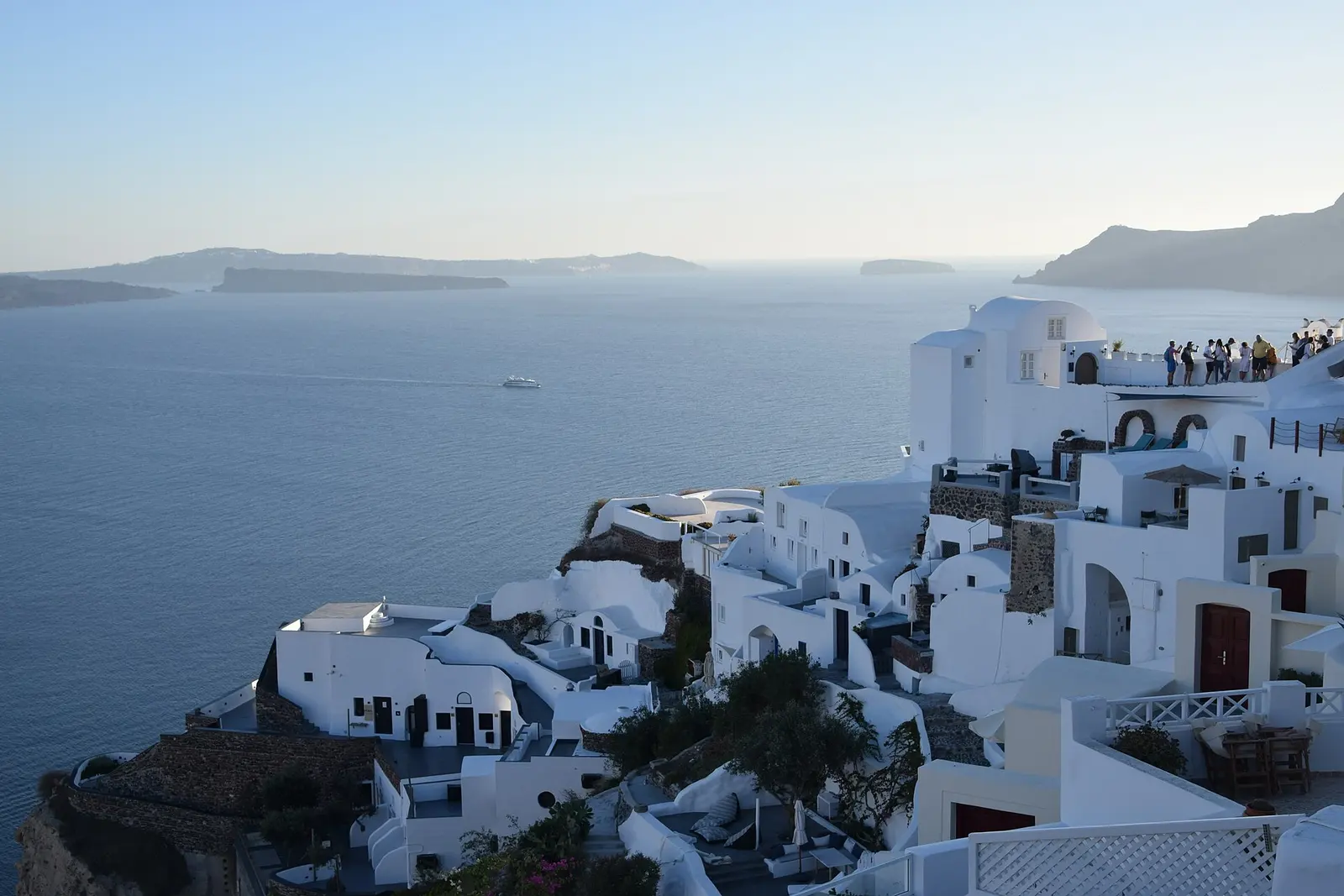White houses of Oia stacked above the caldera, Santorini
