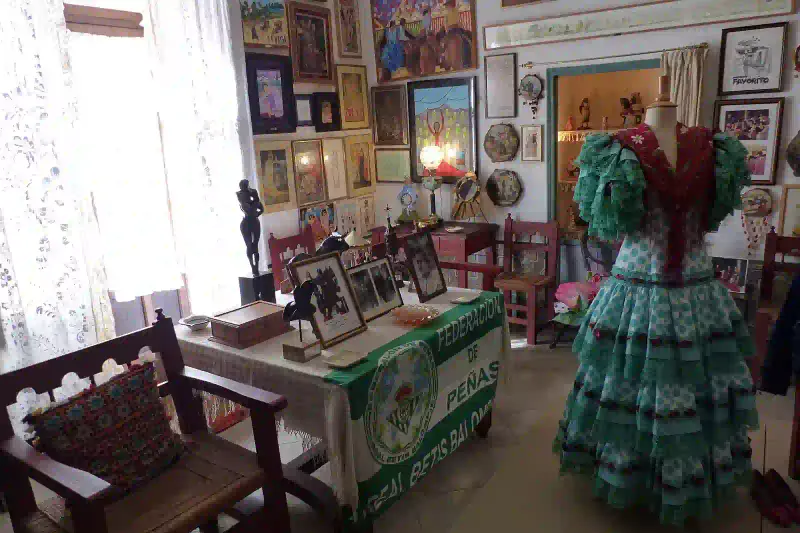 Flamenco dress display in the tablao room of Palacio de las Duenas, Seville