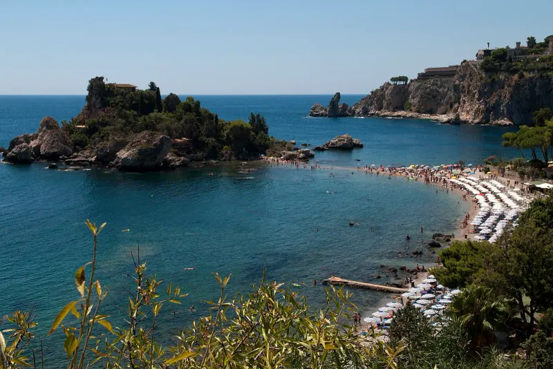 The tiny island of Isola Bella in the bay below Taormina