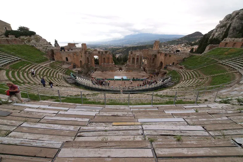 The Greek theatre of Taormina with Etna beyond