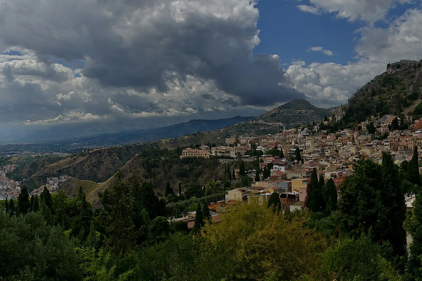 Taormina rooftops and the coast below