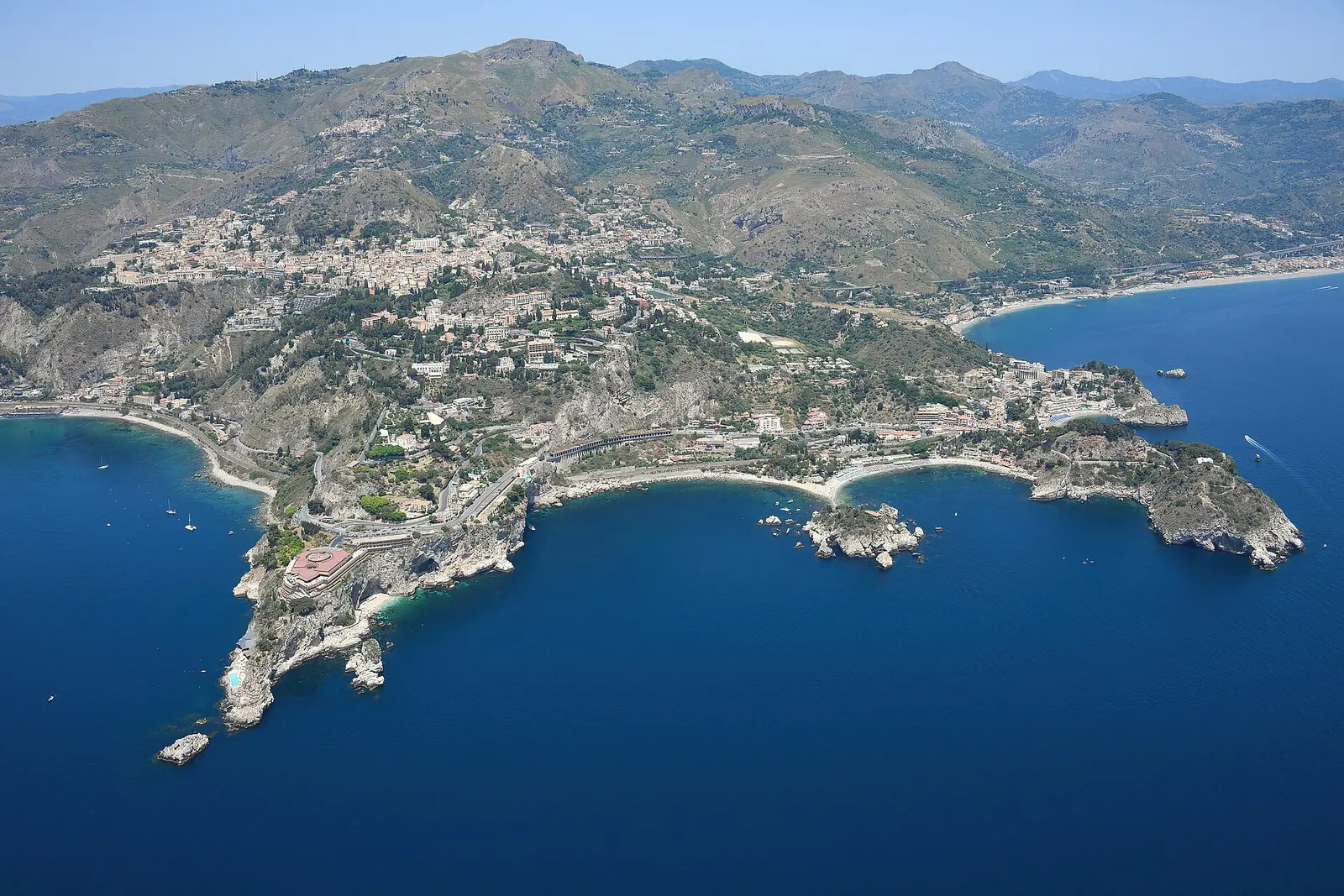 Taormina and its coastline seen from the air above the Greek theatre