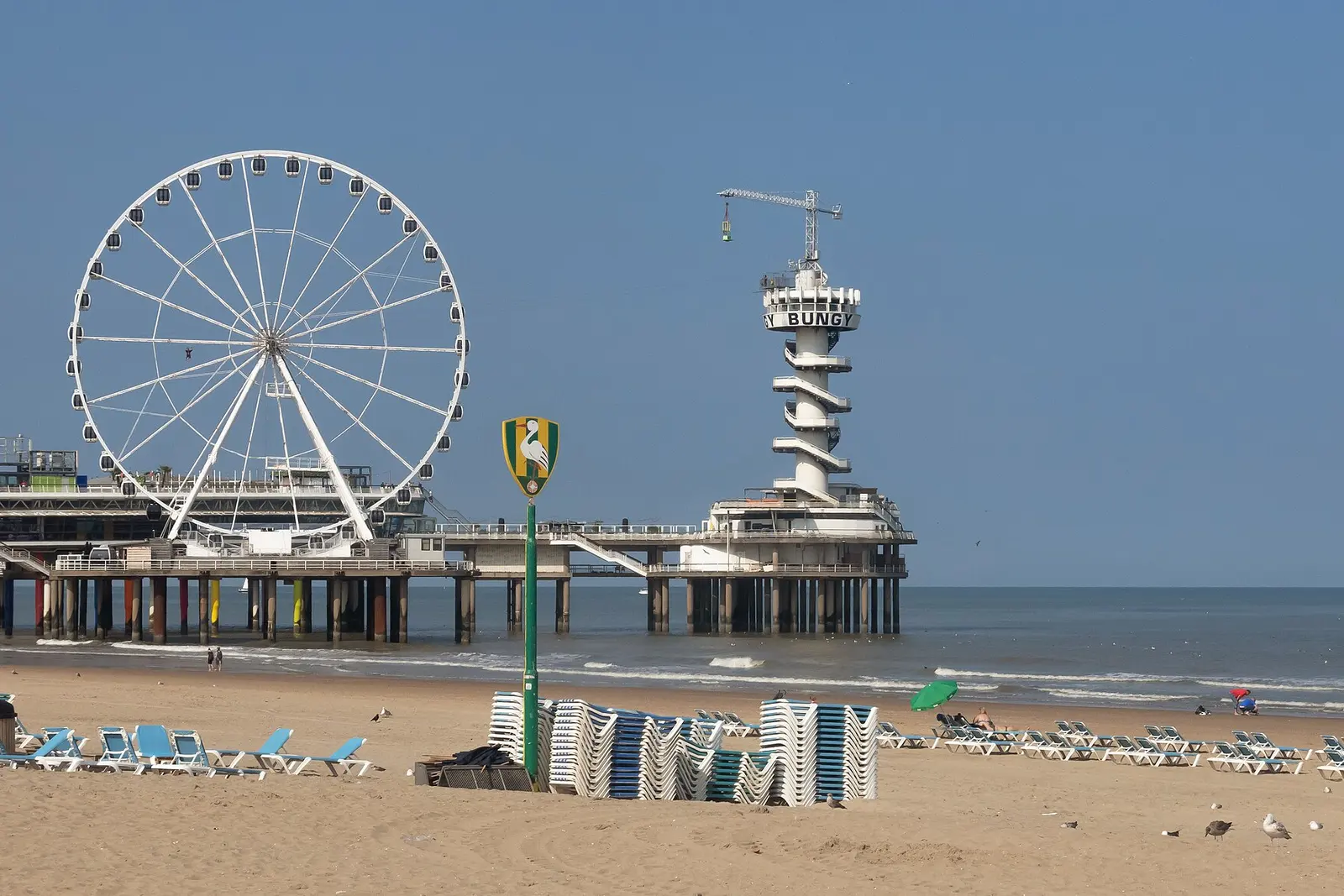 Scheveningen pier and ferris wheel from above the beach