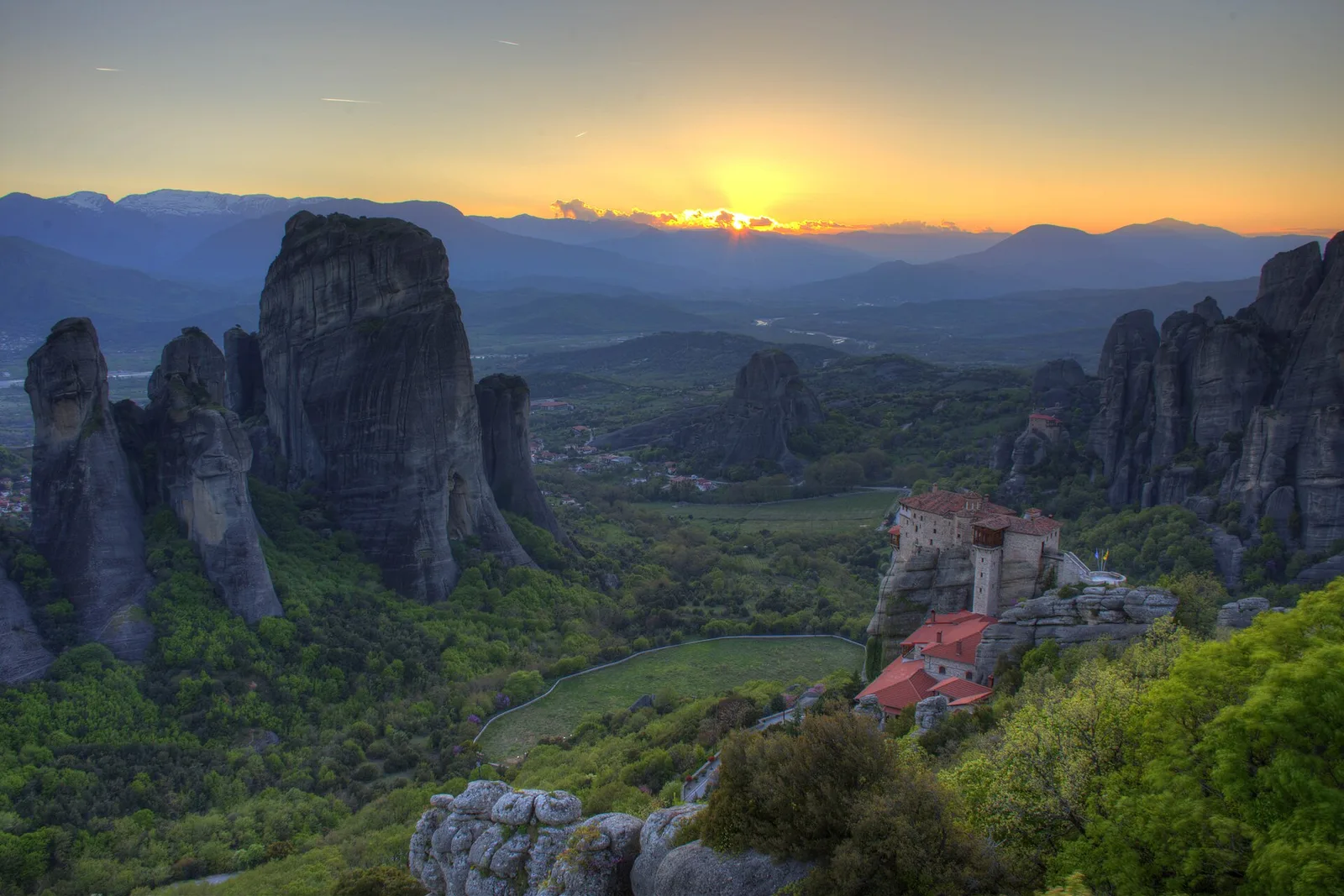 Sunset over the rock pillars and monasteries of Meteora