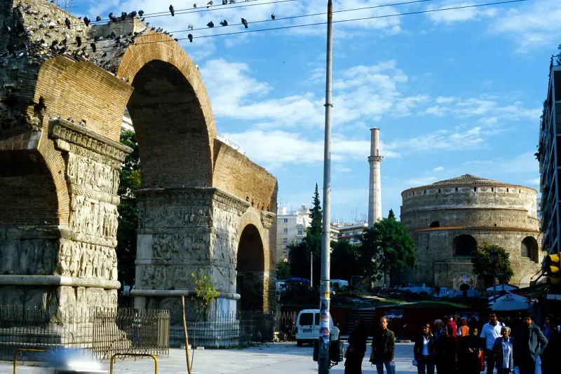 The Rotunda and its minaret beside the Arch of Galerius