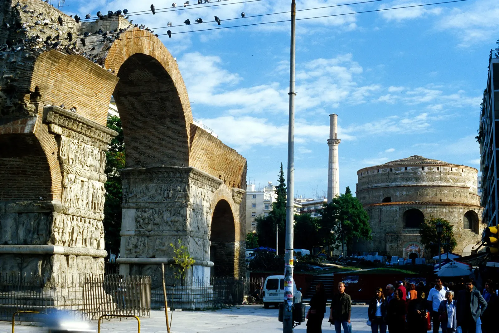 The Rotunda and its minaret beside the Arch of Galerius