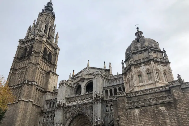Toledo Cathedral's Gothic spire rising above the old town roofs
