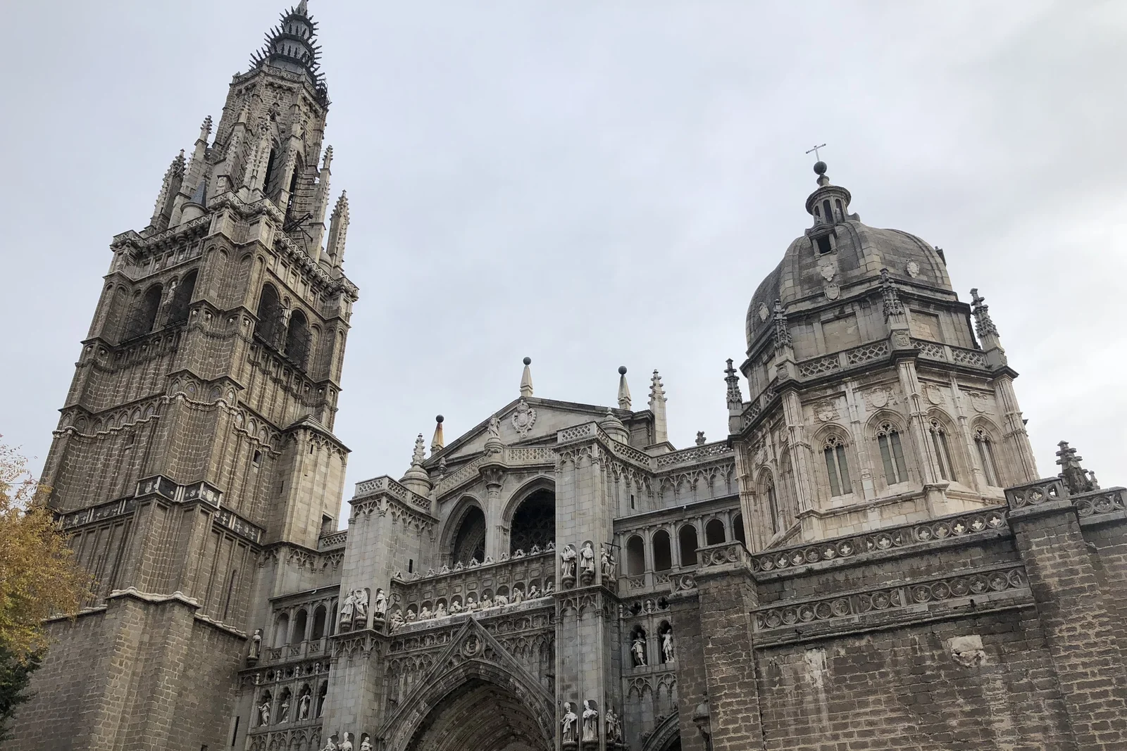 Toledo Cathedral's Gothic spire rising above the old town roofs