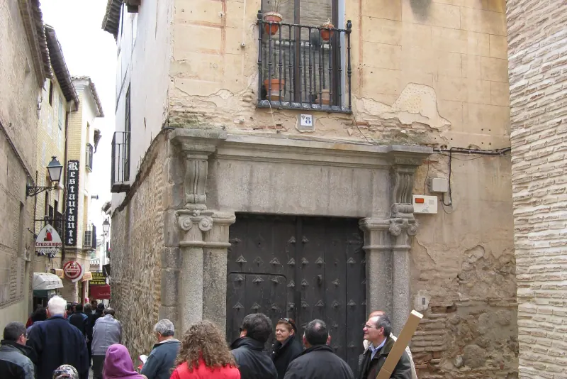 A narrow lane in Toledo's Jewish Quarter lined with old stone houses