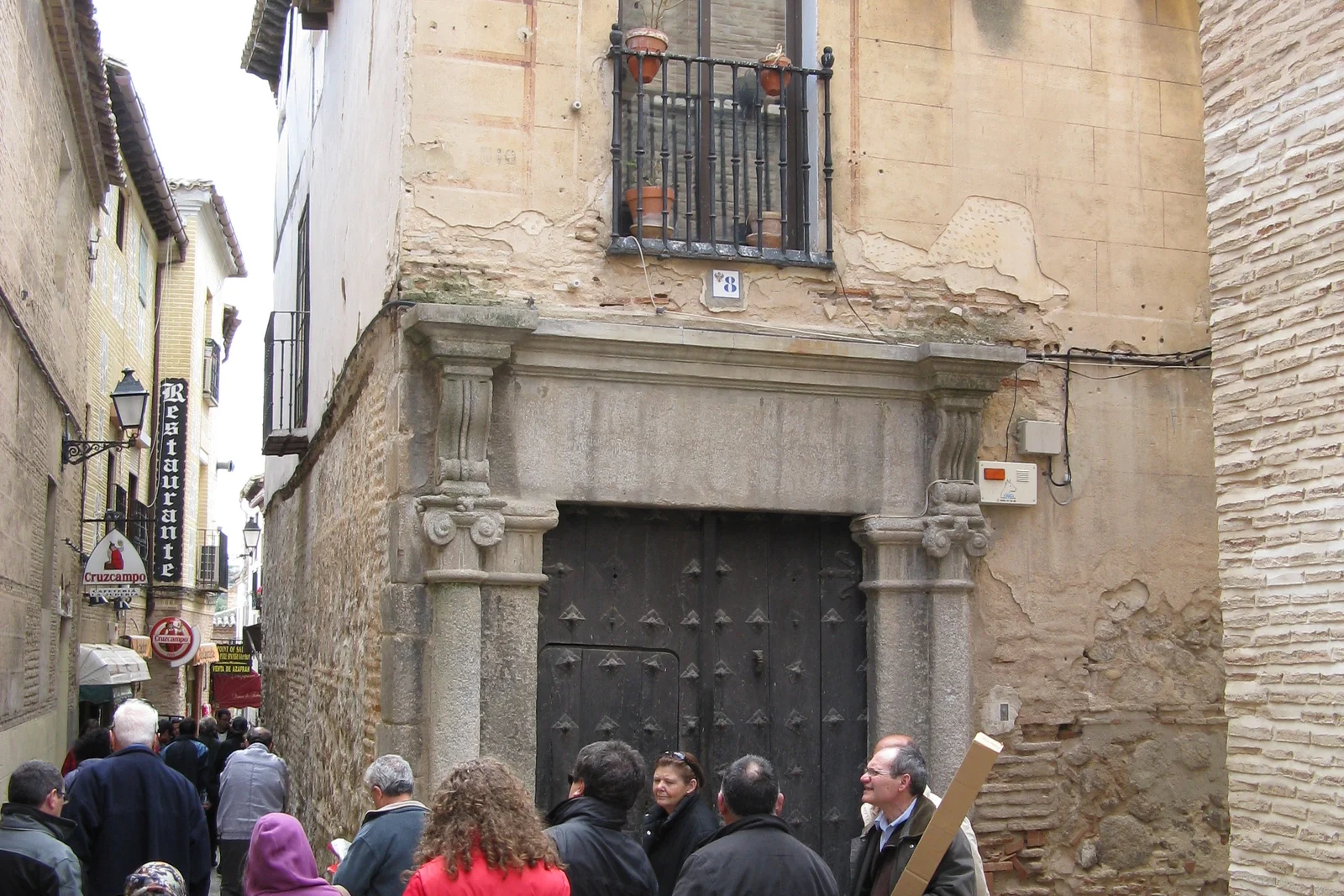 A narrow lane in Toledo's Jewish Quarter lined with old stone houses