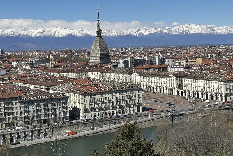The Turin skyline with the Mole Antonelliana and the Alps