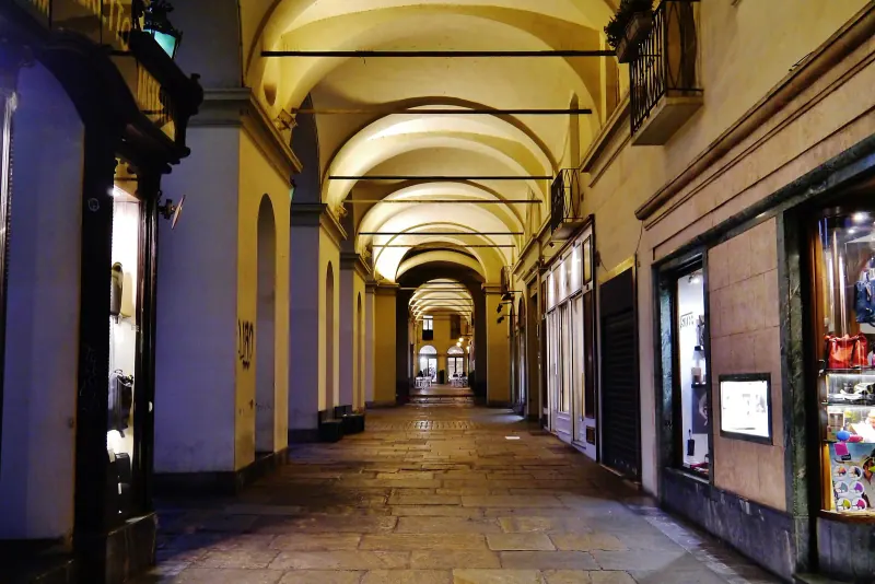 The arcades of Via Po in Turin at night