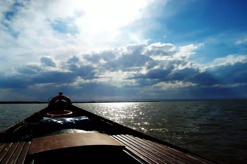 Wooden boat on the Albufera lagoon near Valencia at dusk