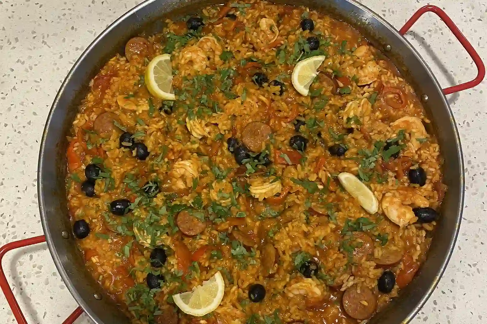 Traditional Valencian paella resting in the pan