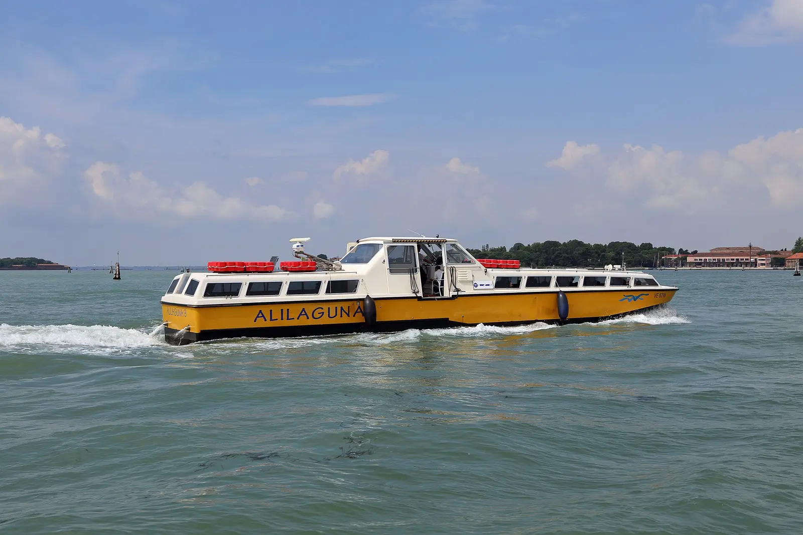 An Alilaguna water bus crossing the lagoon