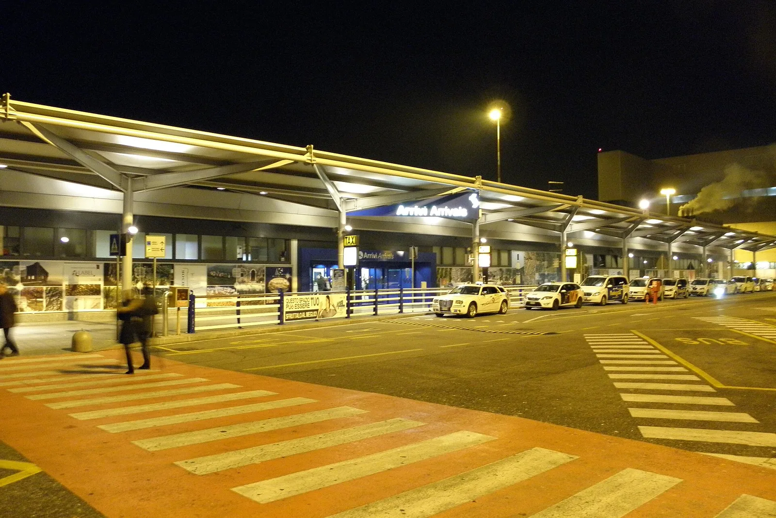 The departures area of Verona Villafranca airport at night