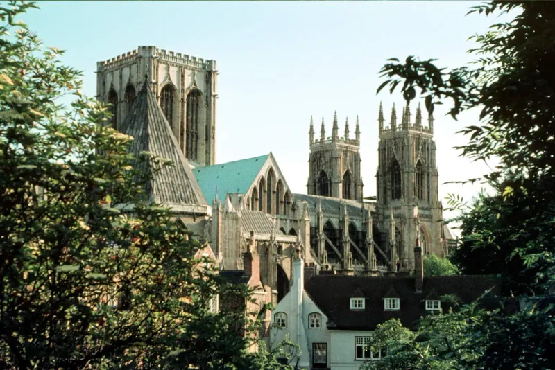 York Minster rising above rooftops from the city walls