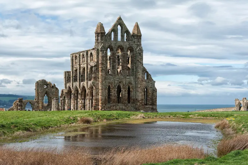 The ruins of Whitby Abbey on the headland above the town