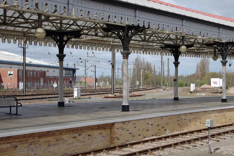 A Northern train under the canopy of York railway station