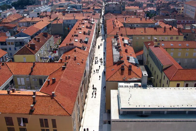 The cathedral bell tower over Zadar's old town roofs