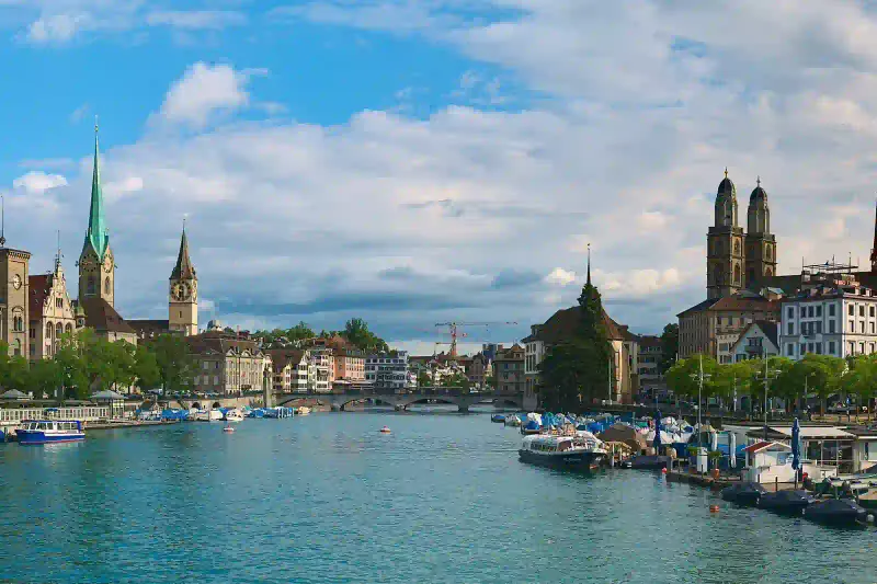 Zurich old town along the Limmat river with the Grossmünster towers